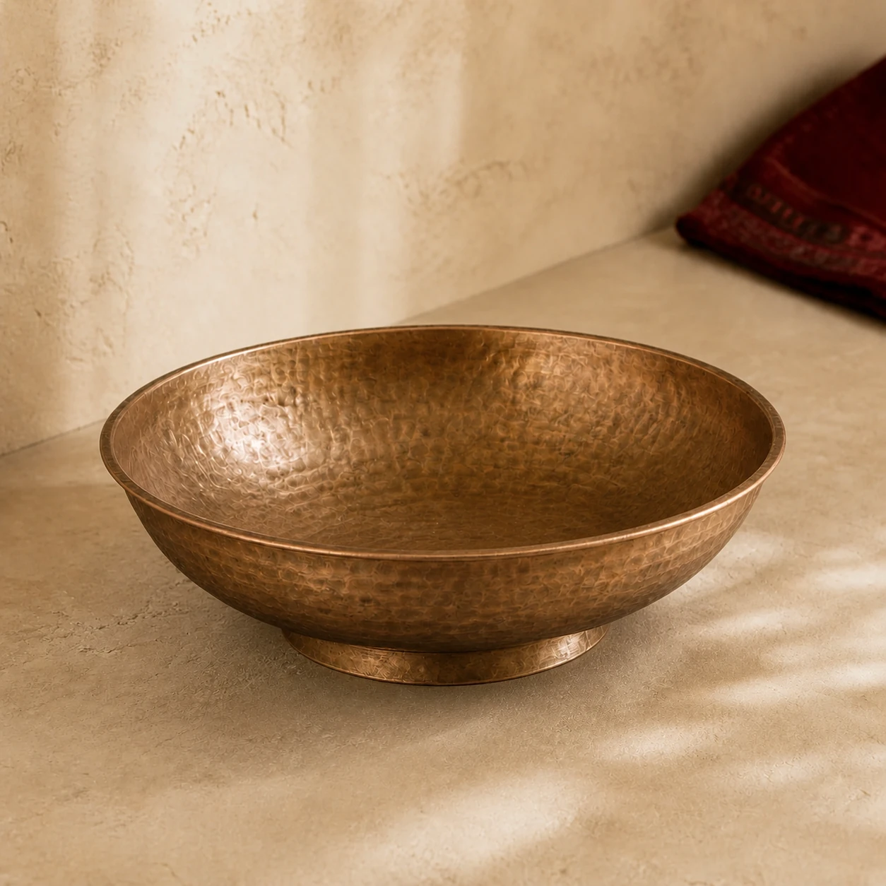 Representative Kansa (bell metal) bowl in a warm Indian home setting